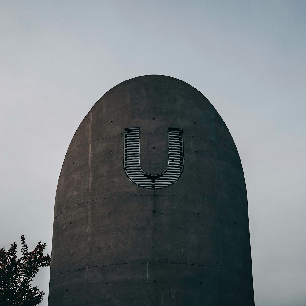 low-angle photography of black building