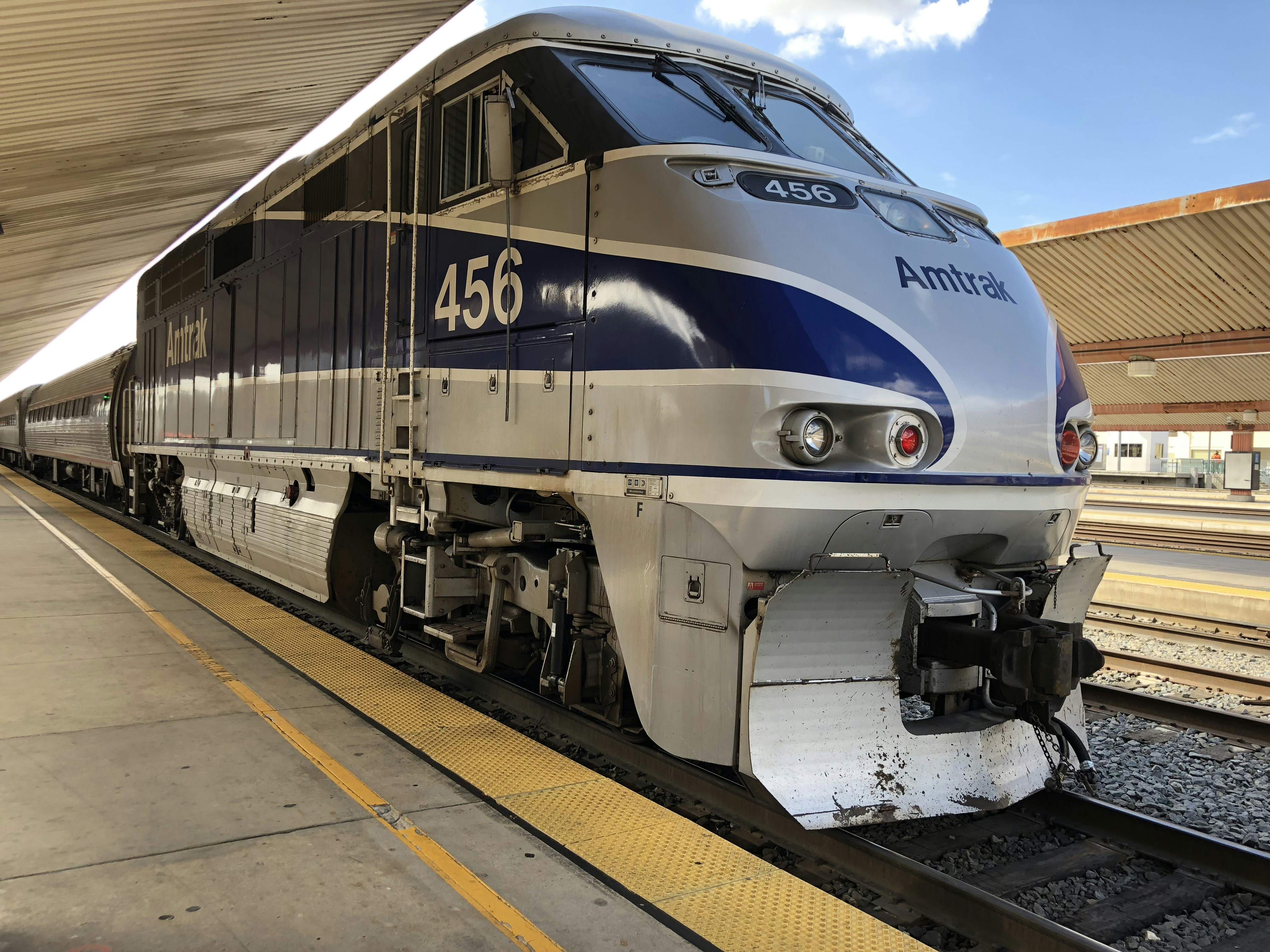 gray Amtrak train, Amtrak Train. Most Pacific Surfliner trains are with double-decker train cars. This one is a single decker train I took. Feb 14 2018, Pacific Surfliner 572, LAX - SAN.