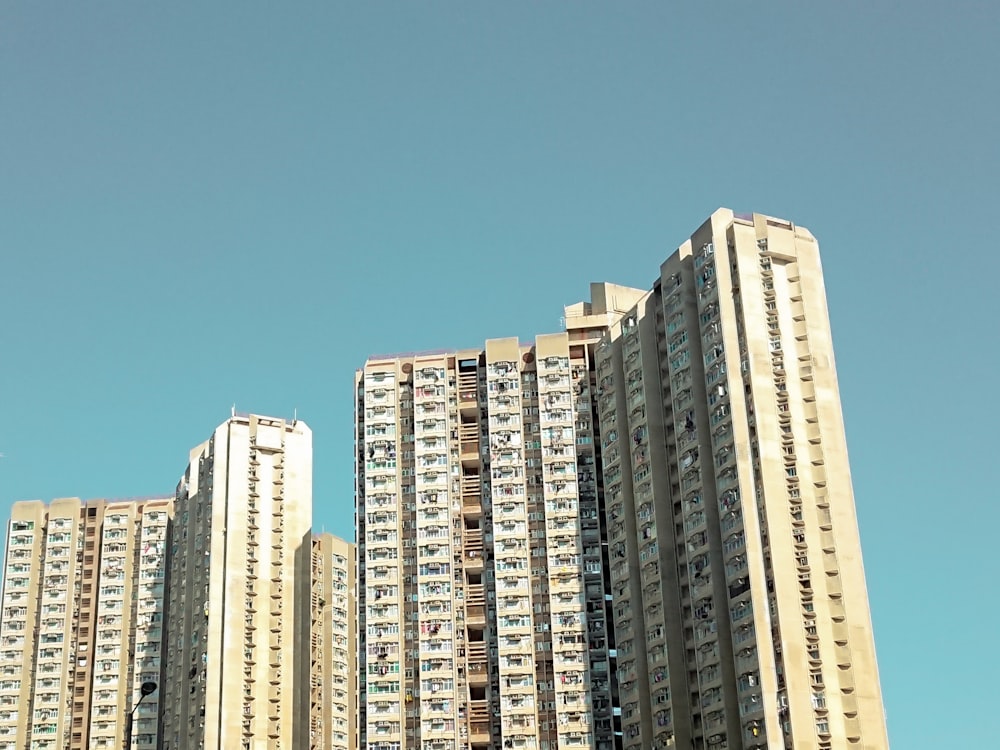 brown and white concrete building during daytime