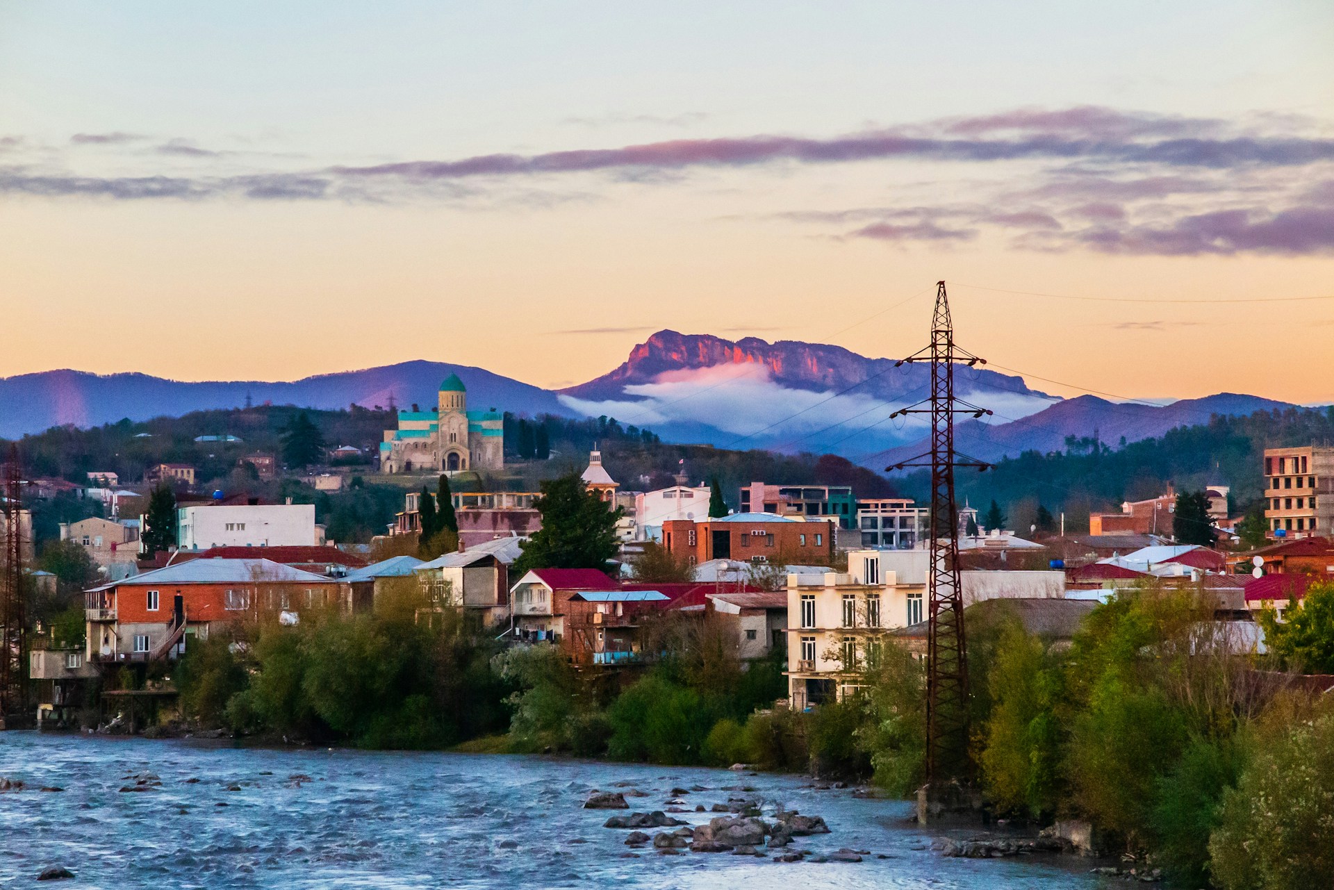 A stunning landscape view that complements the architecture, infused with shades of brown and pastel colors.