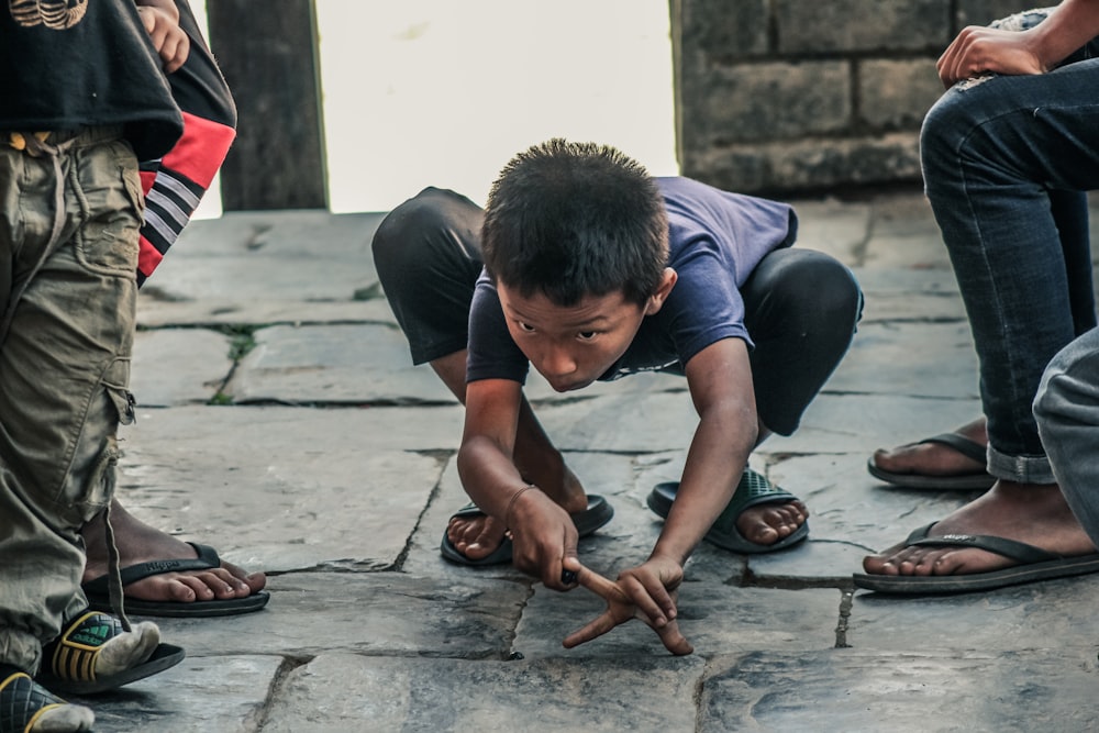 boy playing on street