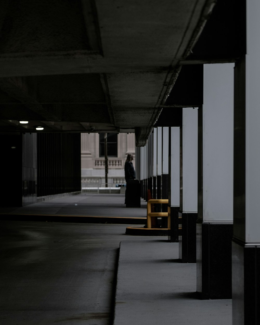 person standing near building