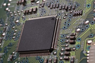 close-up photography of green motherboard