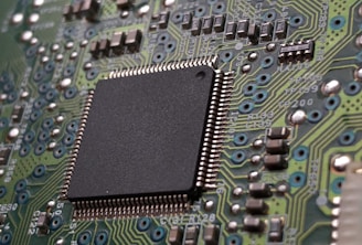 close-up photography of green motherboard