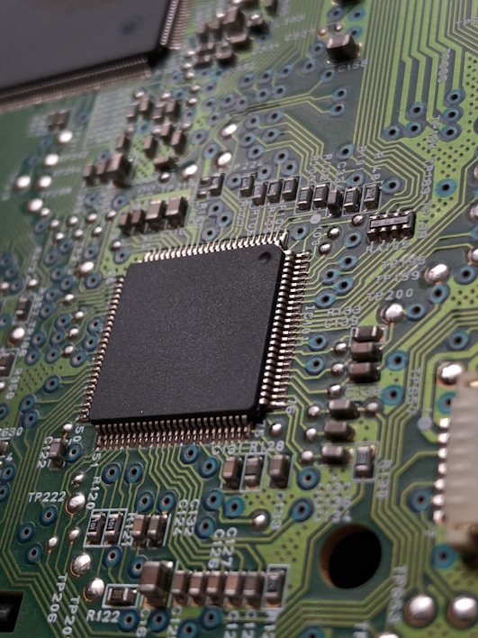 close-up photography of green motherboard