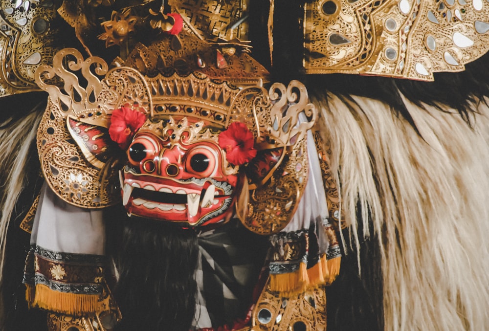 red and white monster head ornament