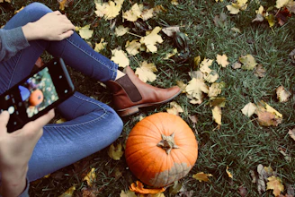person showing red squash on phone