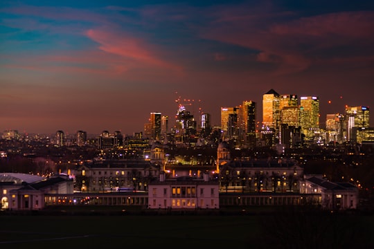 lighted-up city skyline in Greenwich Park United Kingdom