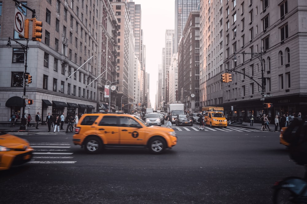 time lapse photography of running vehicles on road during daytime