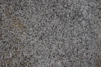 Close-up of a quartz countertop edge showcasing detailed craftsmanship.