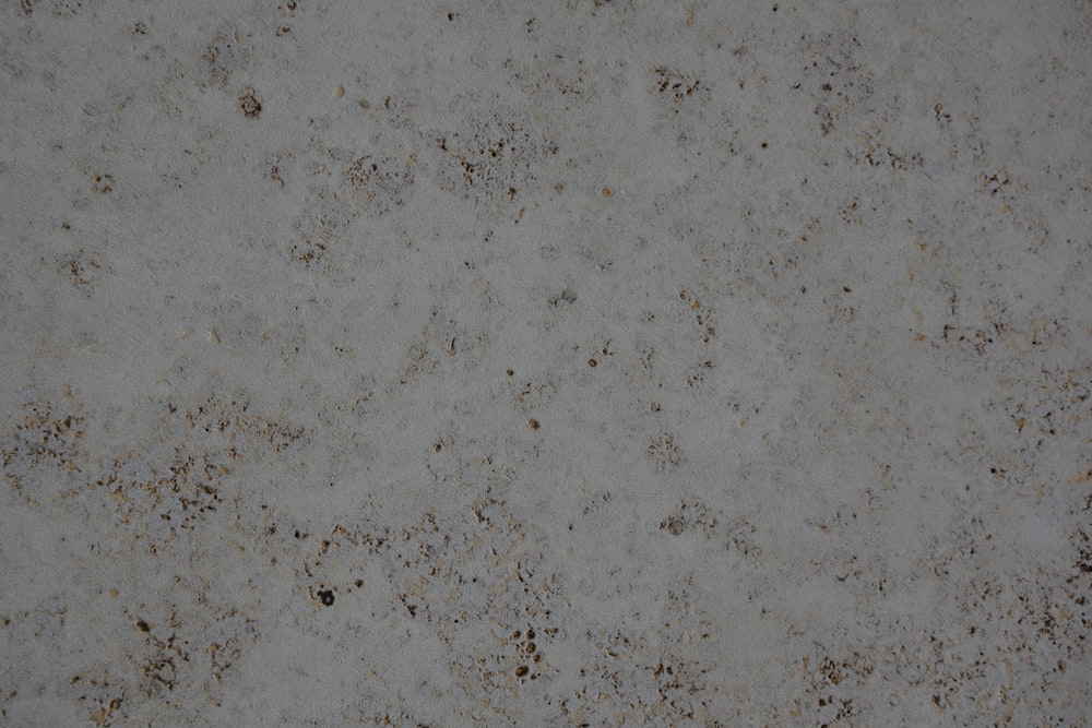 a close up of a white marble surface