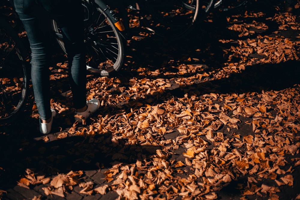 person standing in front of bicycle