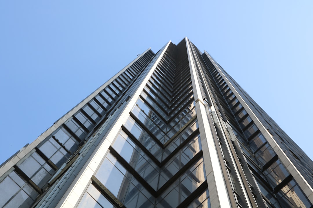 low-angle photography of glass building