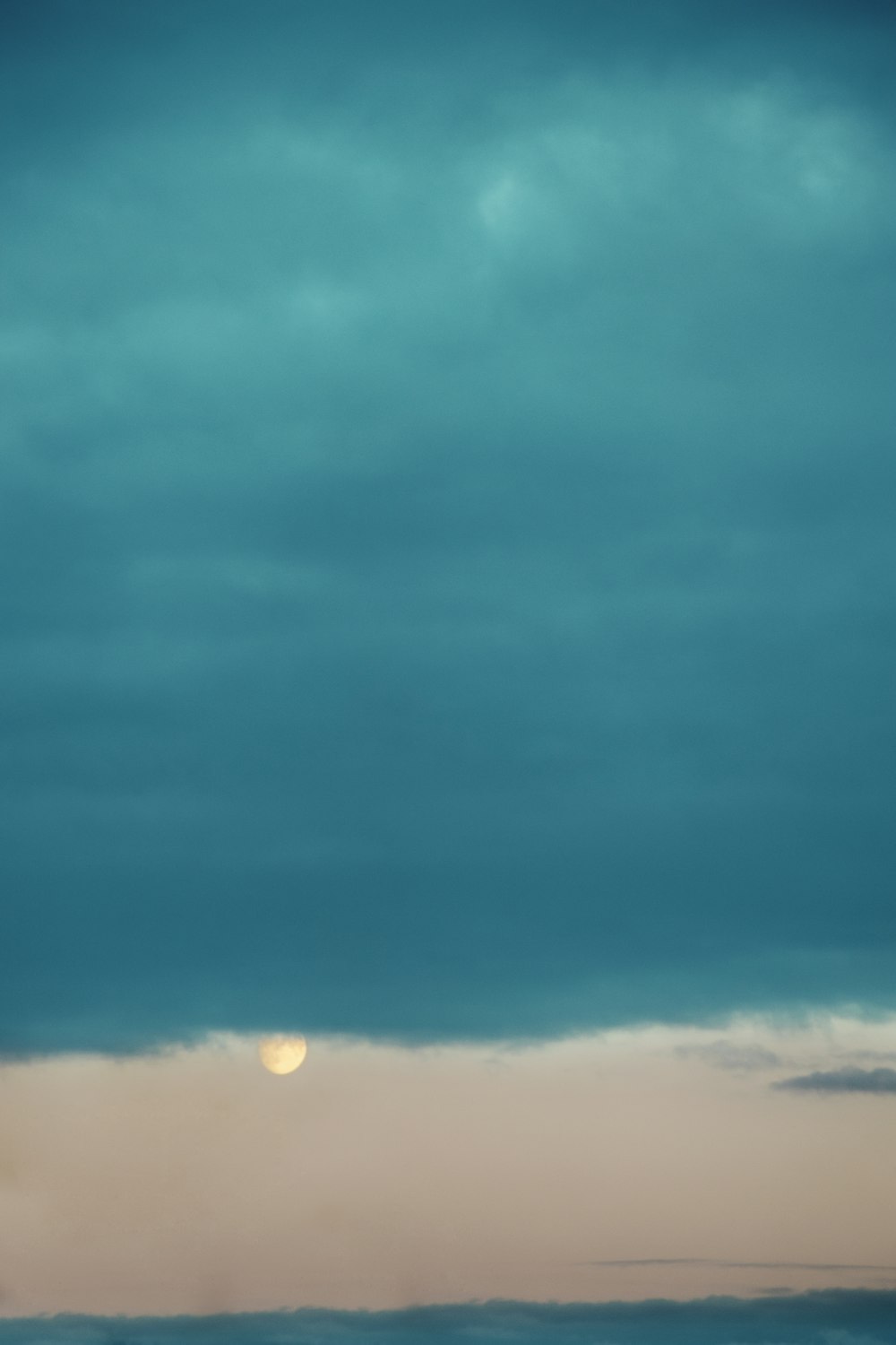 full moon with blue sky