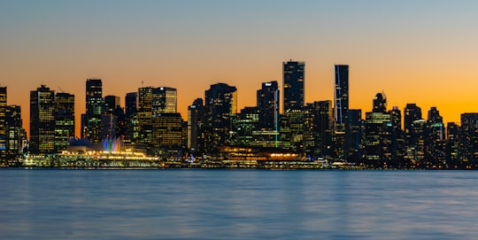 landscape photography of city near ocean in Lonsdale Quay Market Canada