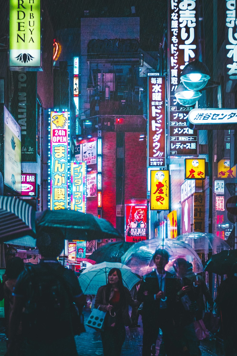 people under umbrella while walking