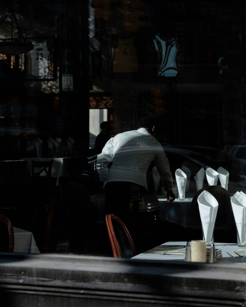 man serving inside restaurant