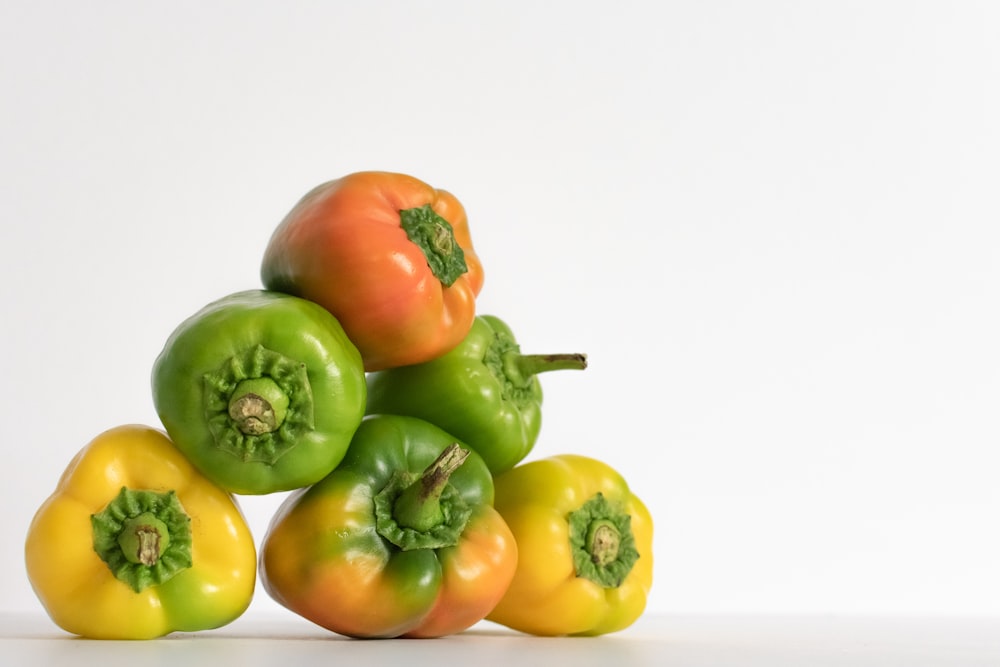 green, yellow, and orange bell peppers