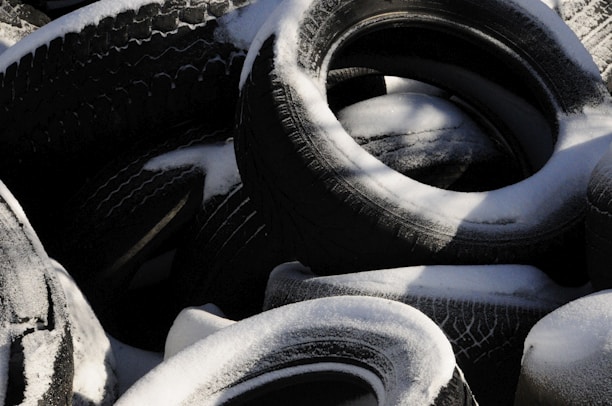A selection of high-quality winter tires displayed in a store.