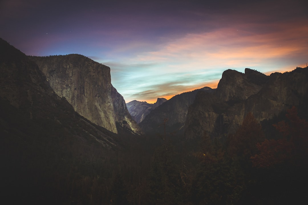 grey mountains during sunset