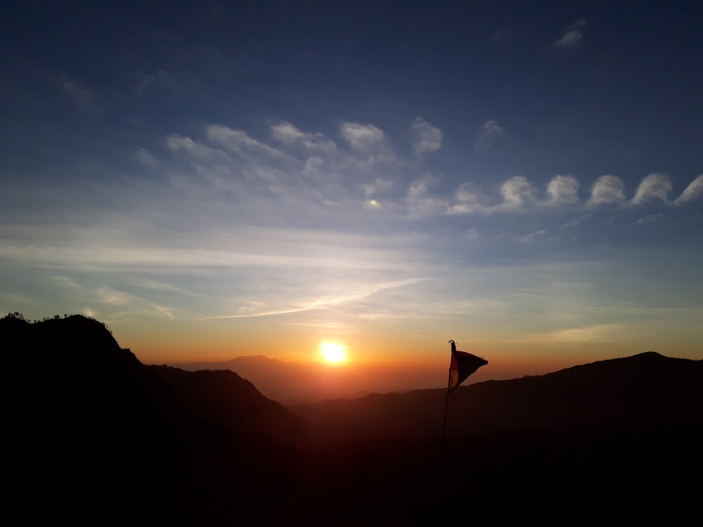 silhouette of flag during golden hour