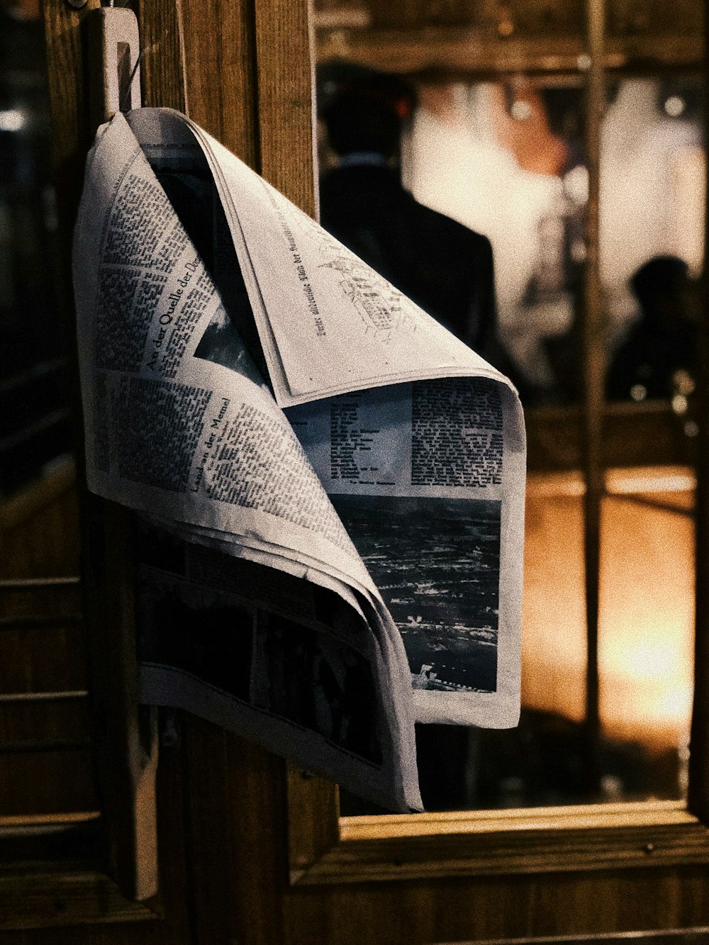 newspaper on door