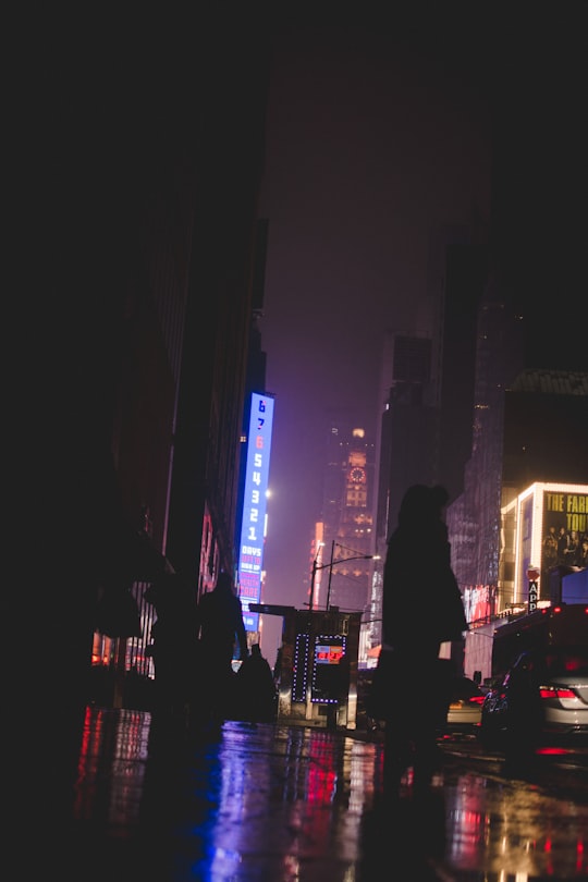 vehicles at the road during nightime in Times Square United States