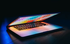 MacBook Pro turned-on in dark room