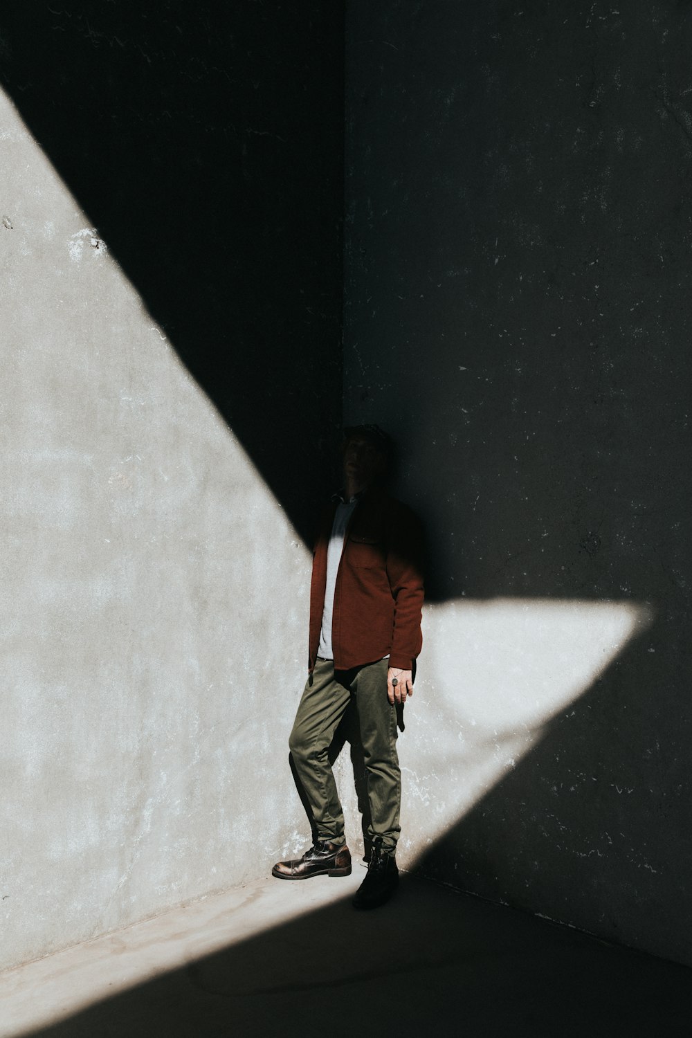 man standing posing for photo