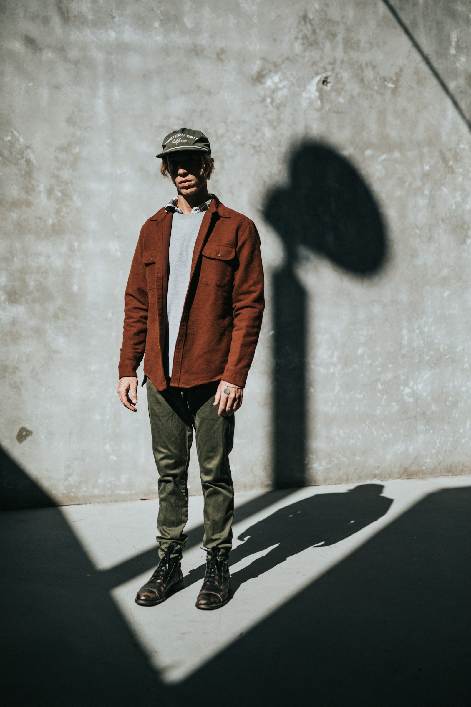 Canon EOS 5D Mark IV sample photo. Man stands near concrete photography