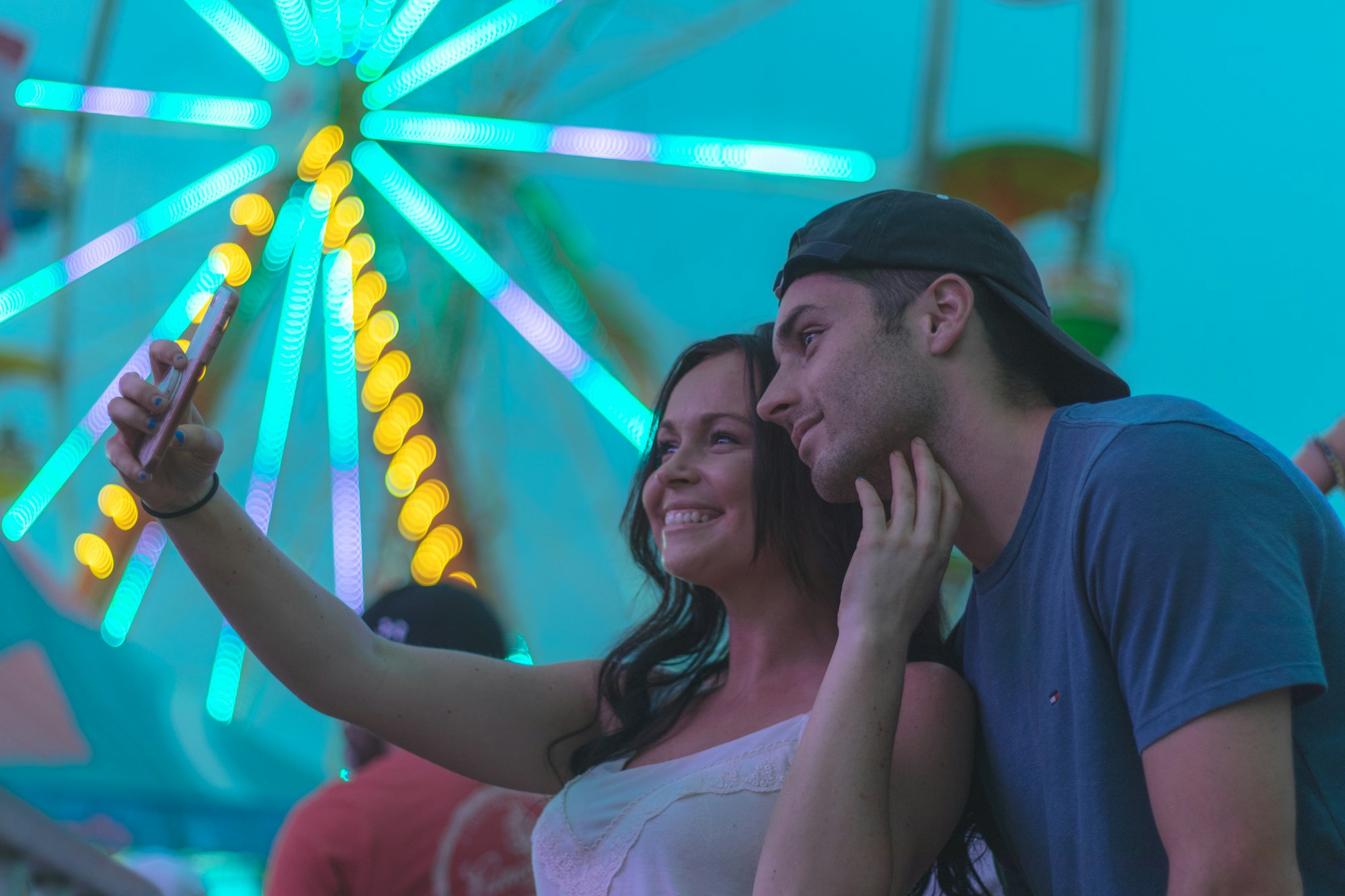 Couple taking a selfie together outdoors