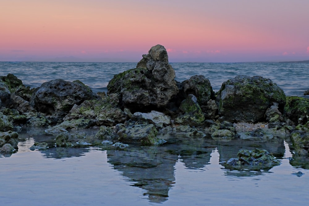 gray rock formation at seashore