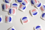 Voted printed papers on white surface