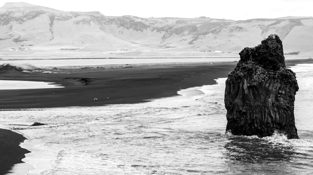 body of water and rocks