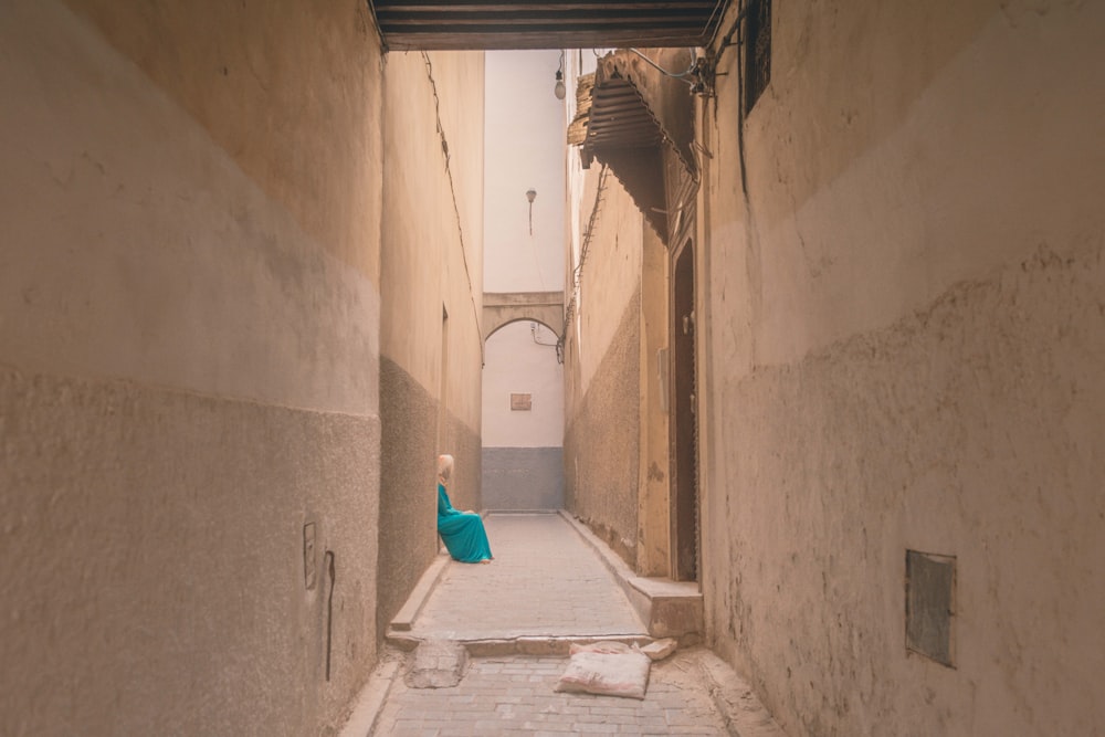 woman sitting on doorway