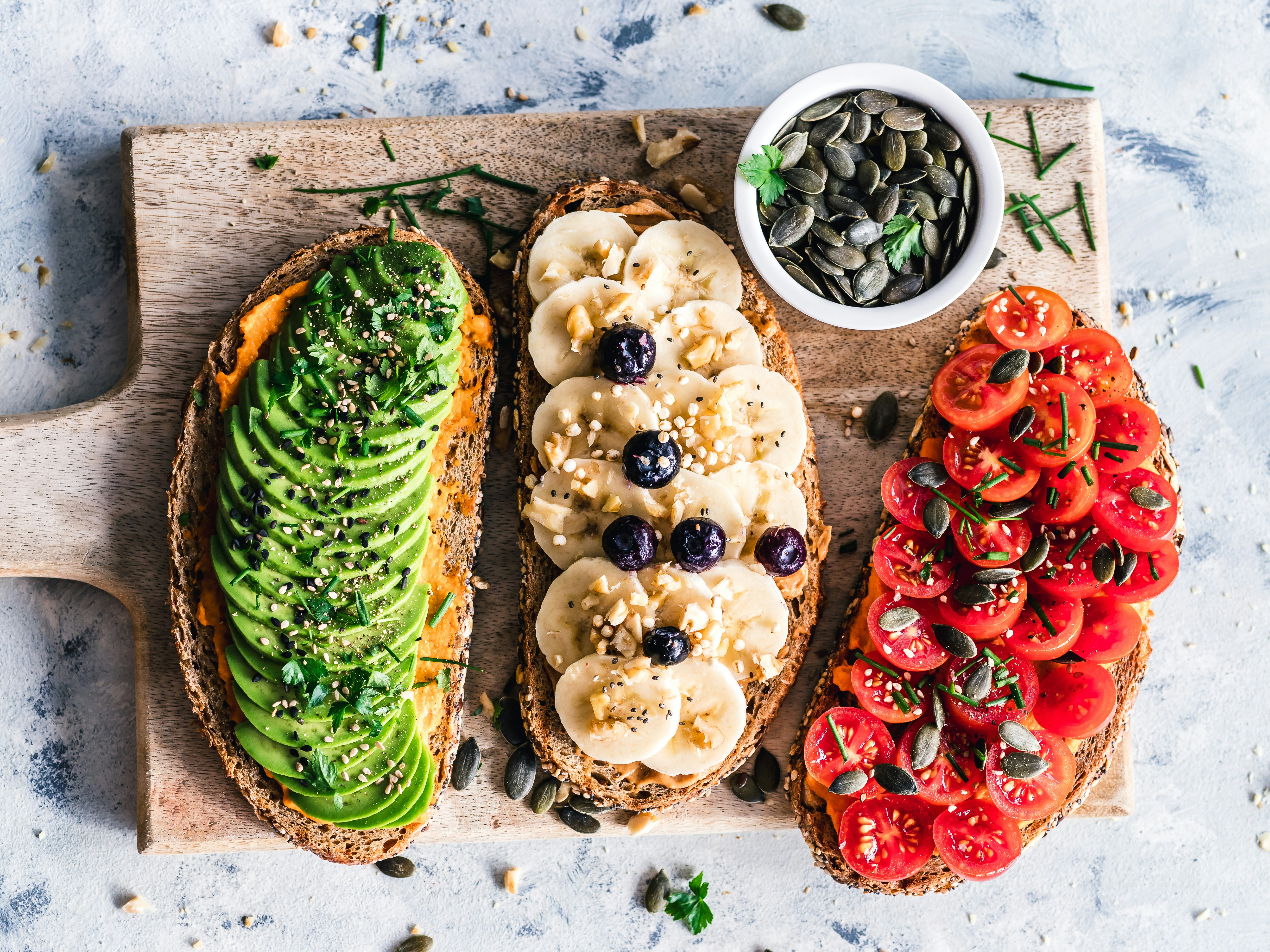Bread toasts with avocado, banana, tomato. Easy to make, great for a quick breakfast.