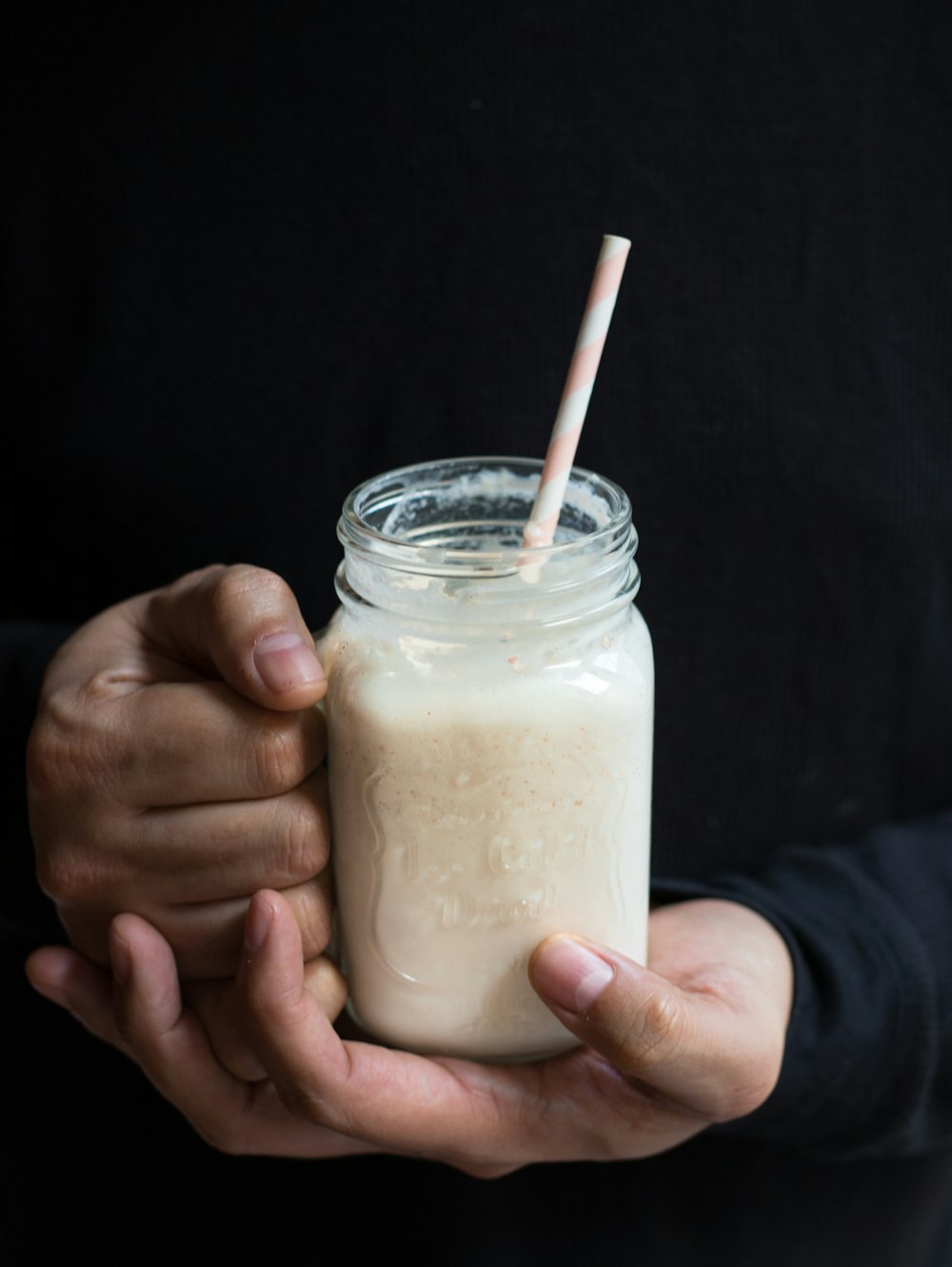 clear glass jar mug filled with white liquid