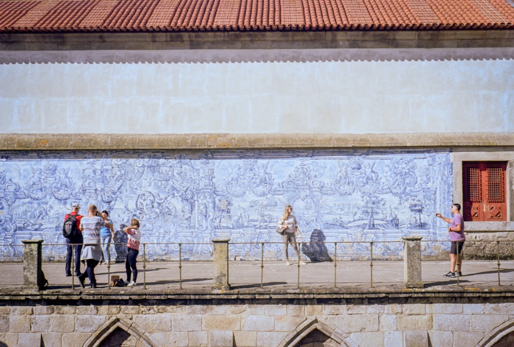 woman standing near wall