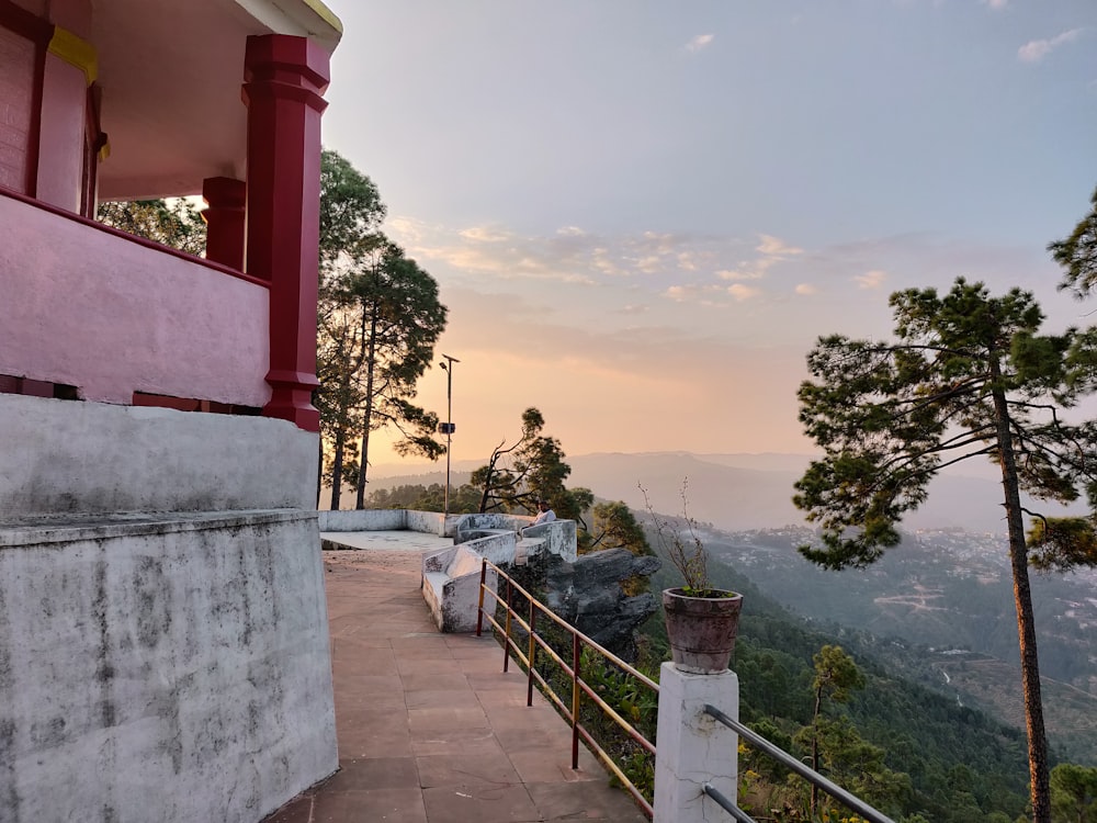 pink and white terrace overlooking mountains