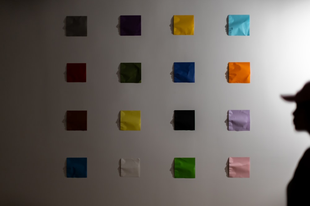 multi colored sticky notes on the wall