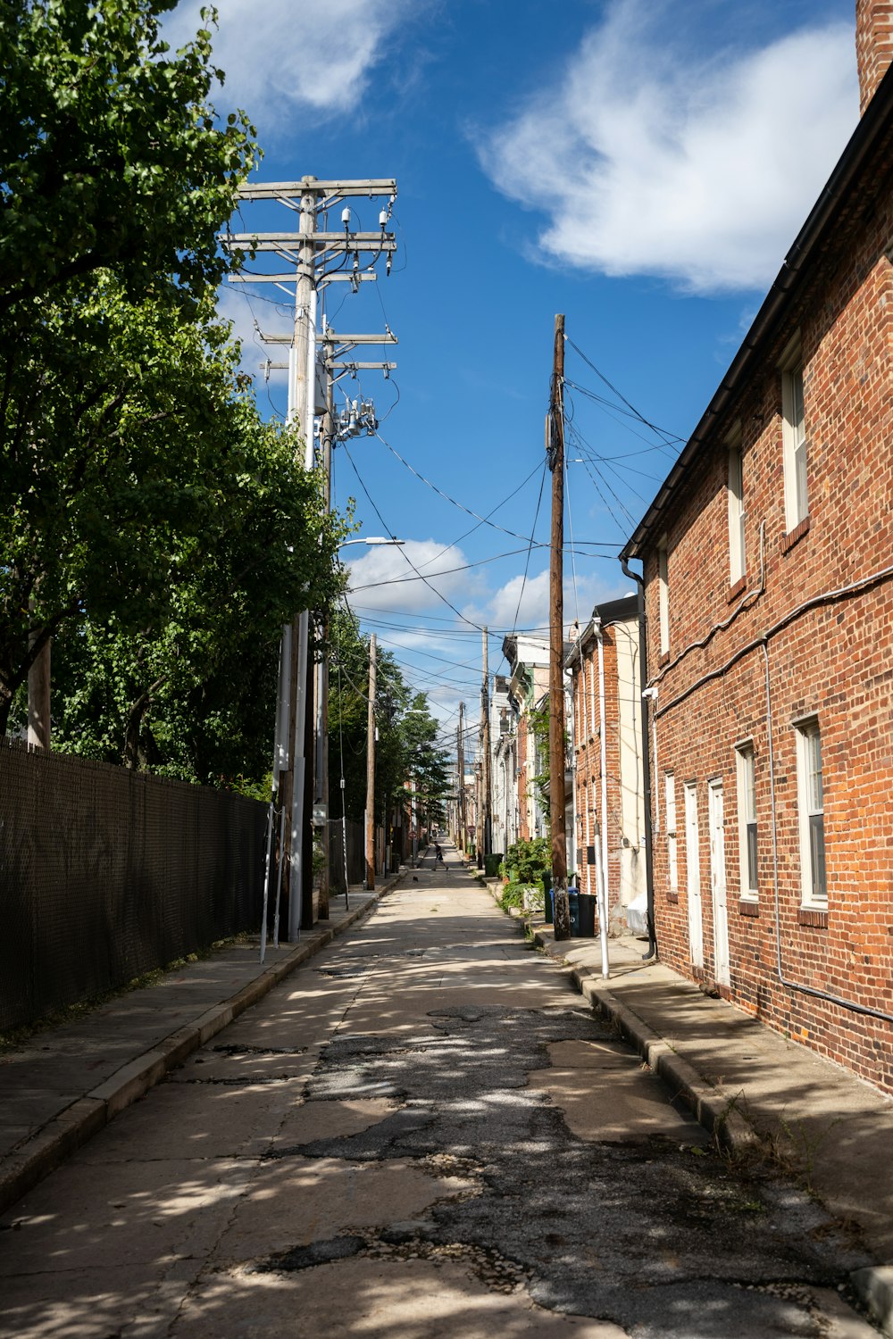 road near brown house