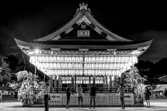 group of people near the building in Yasaka Shrine Japan