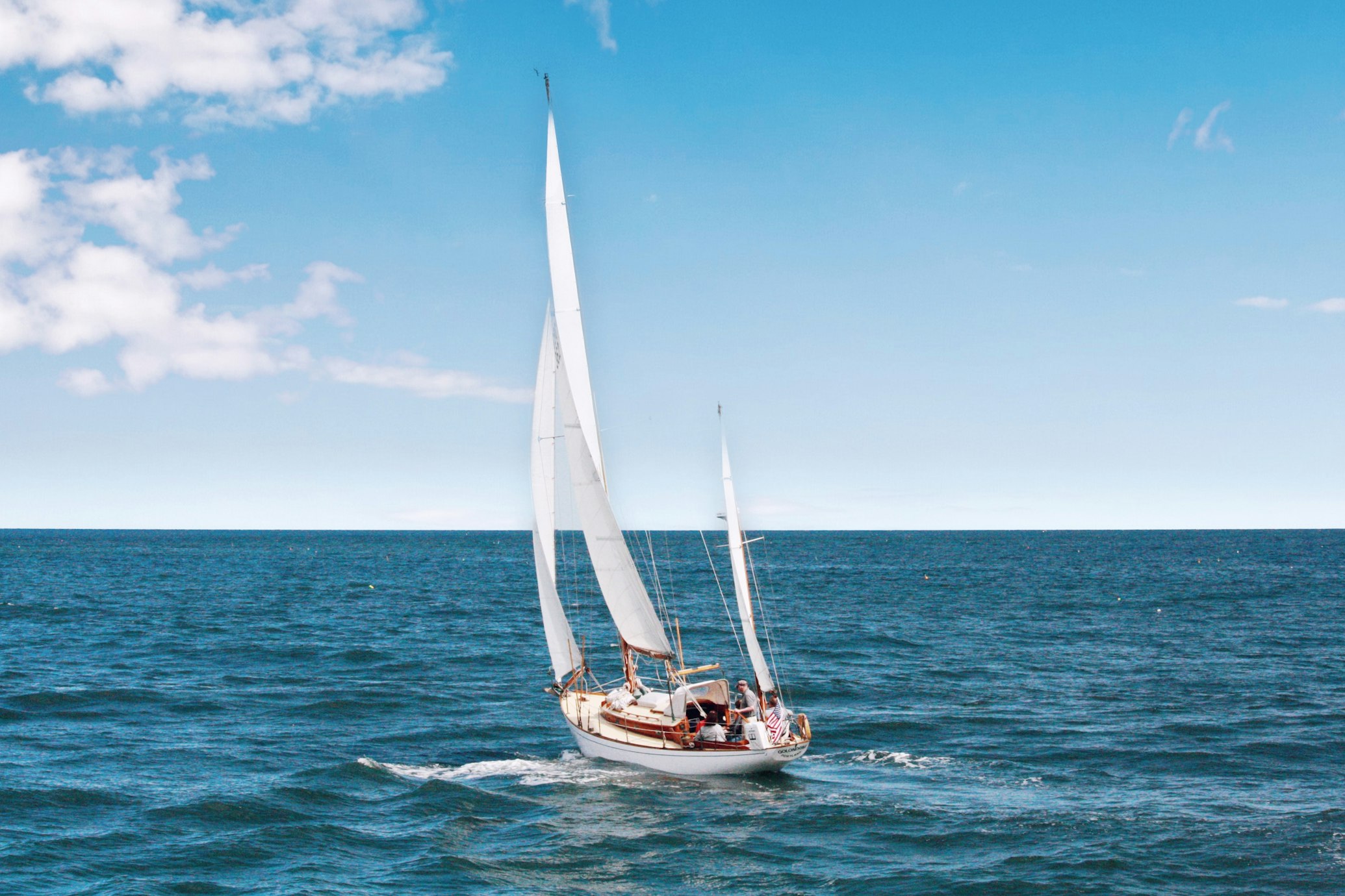 boat sailing on the water in summer