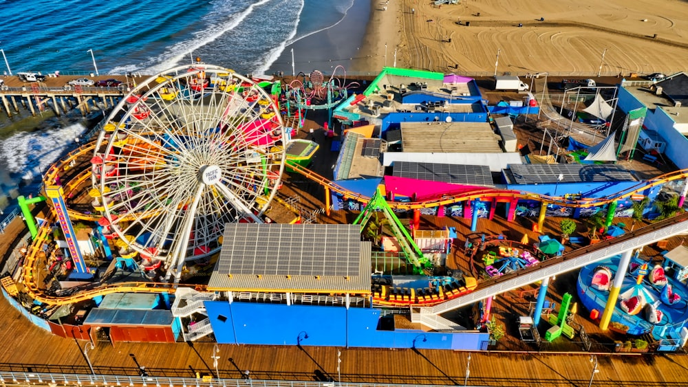 Ferris wheel near body of water during daytime