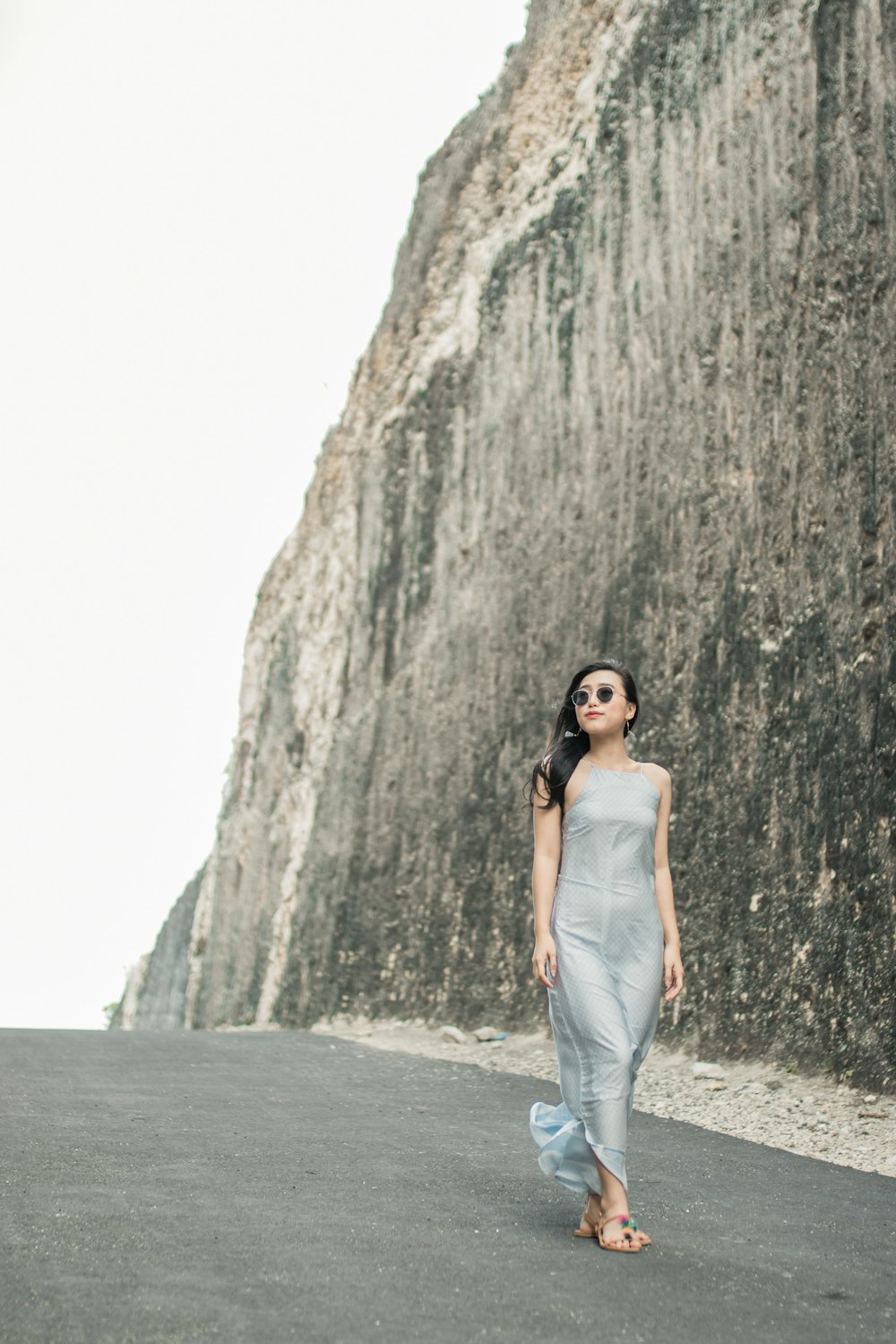 woman walking downhill