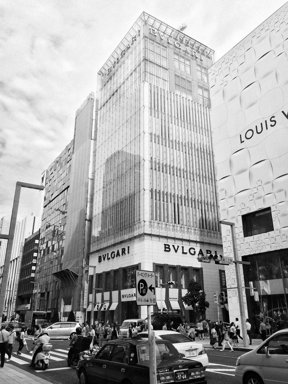 grayscale photo of Bulgari building