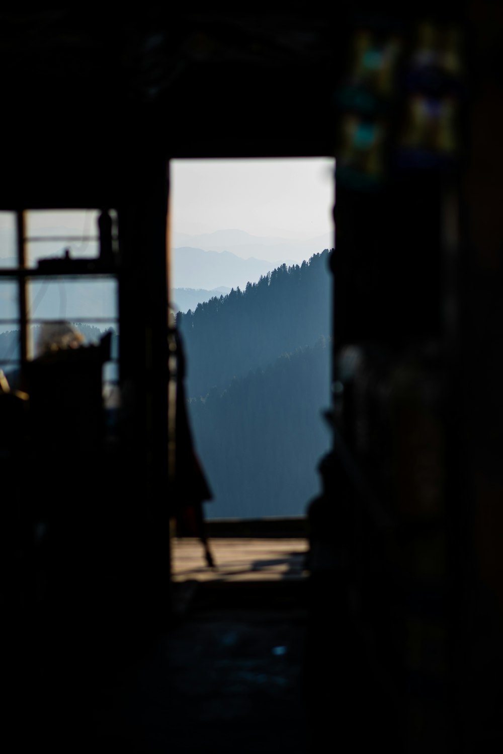 a view of the mountains from inside a building