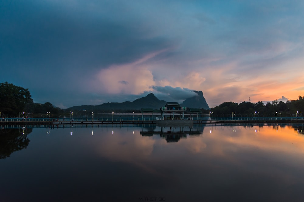 silhouette of mountain with fog