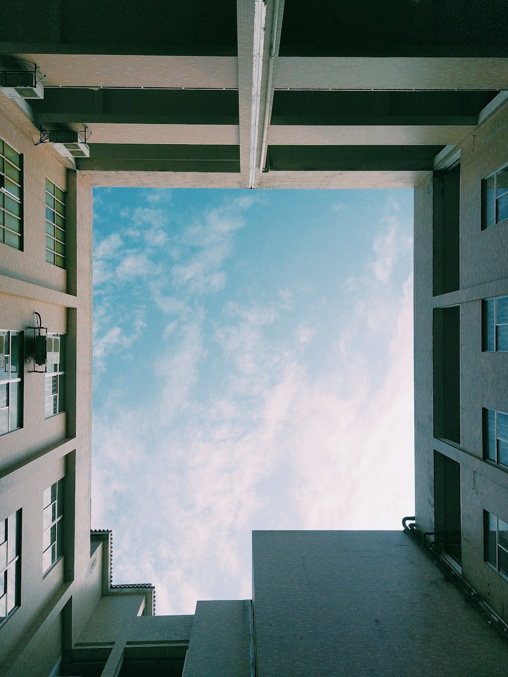 low angle photography of high rise building