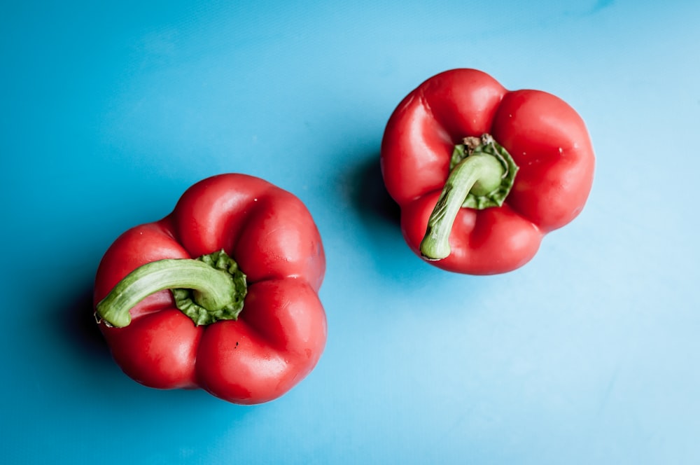 two red bell peppers